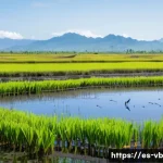 Home 16 기후 난민과 생태계 복원 - A vibrant coastal wetland restoration scene in Colombia featuring local artisanal fishermen working ...